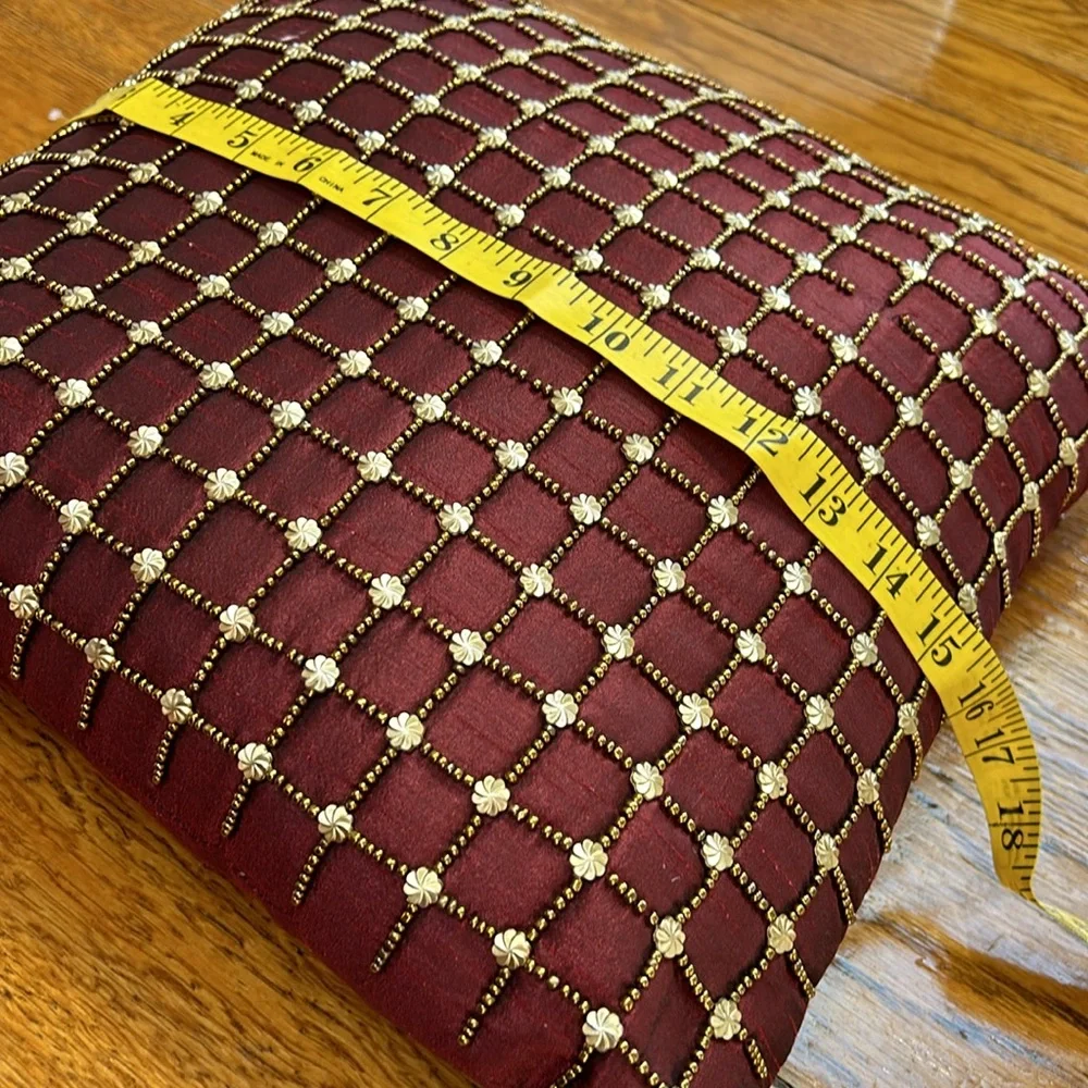 Pier 1 wine accent pillow with beaded details in gold.  Some beads missing. 16”.